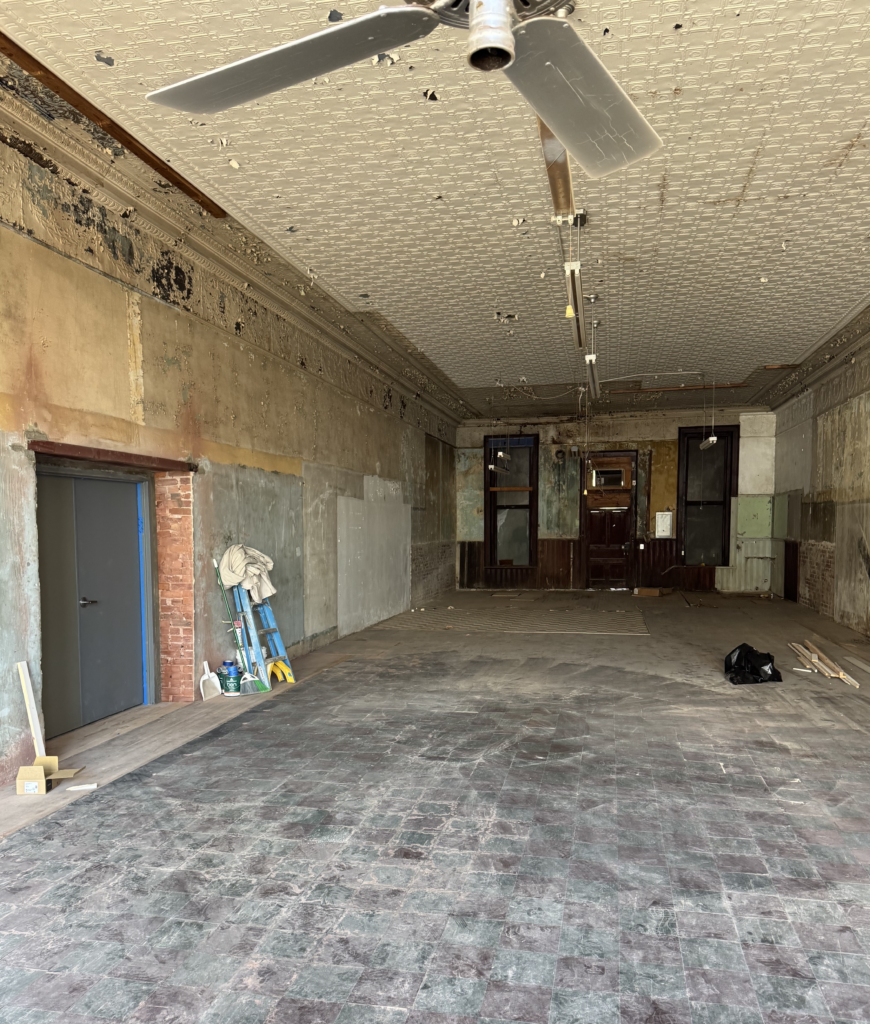 Workers opened a passage through the two-foot-thick brick wall that had separated the Opera House from its west-side space, known locally as Phillips II, since 1903.